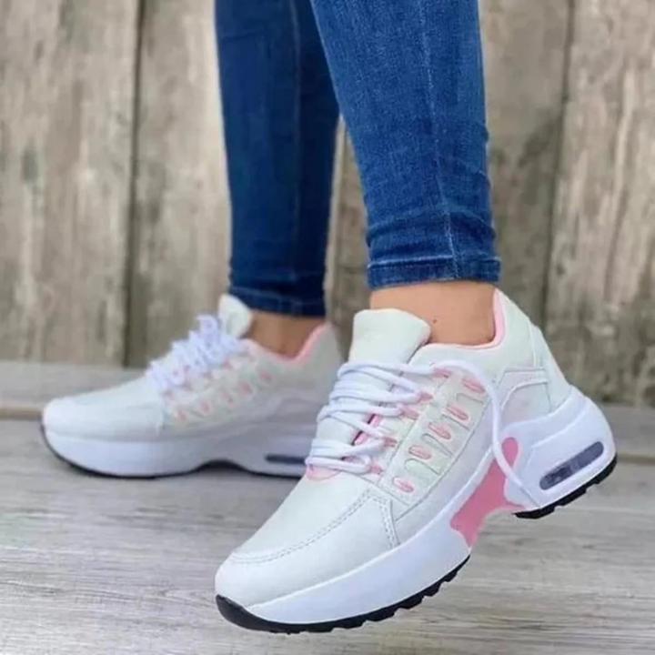 Stylish women's wide-fit lace-up casual sneakers, perfect for versatile everyday fashion.