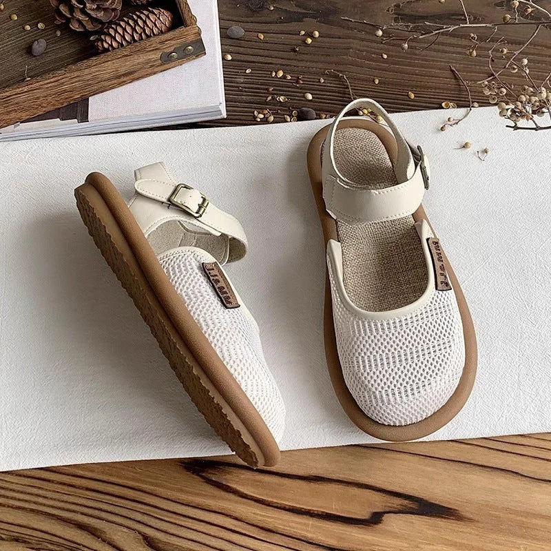 Cushioned wide-fit women's sandals, closed-toe design, with adjustable buckle for a secure & comfortable fit.