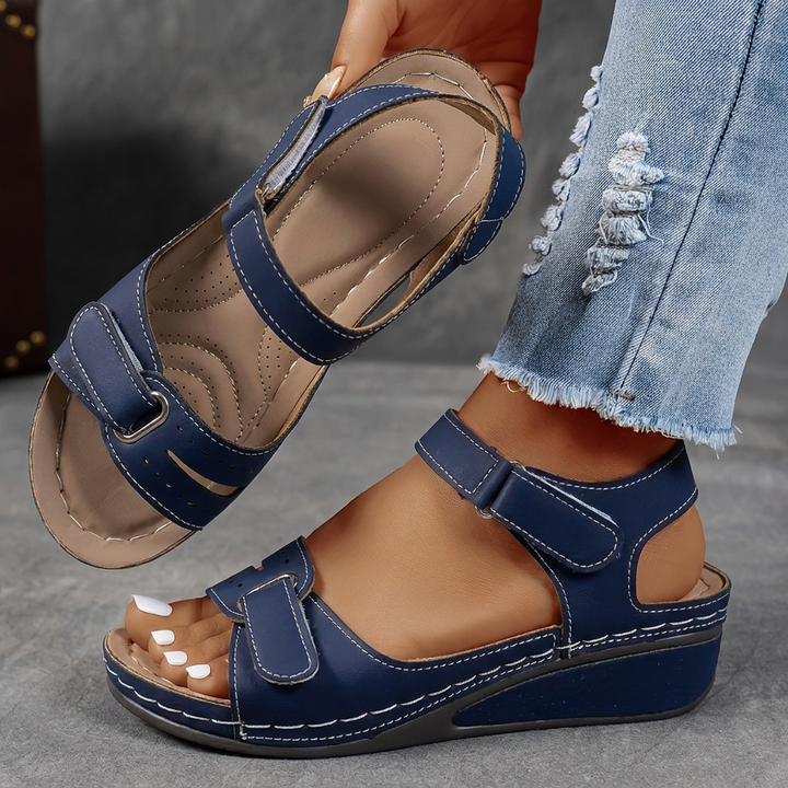 Lightweight women's comfort sandals with a platform sole, wide fit, and adjustable multi-straps.