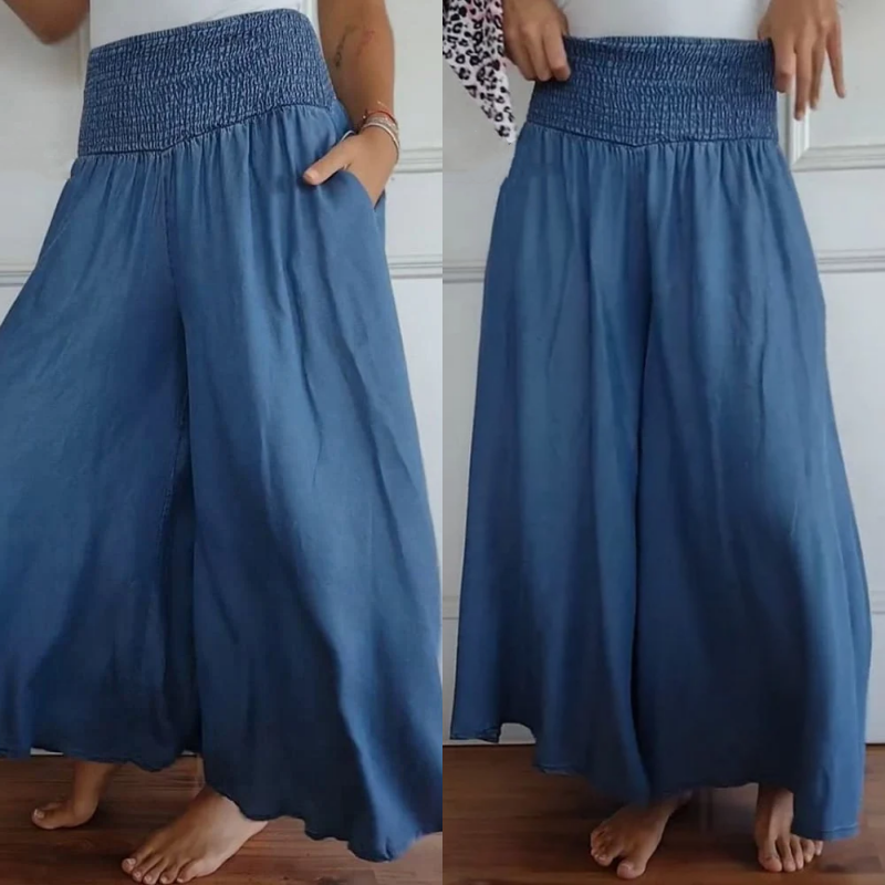 Women's wide-leg high-waist smocked denim trousers for a stylish, comfortable look.