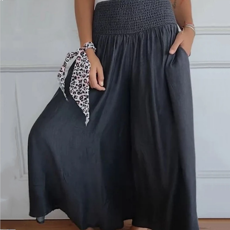 Classic denim wide-leg trousers for women, featuring a high-waist and comfortable smocked design.