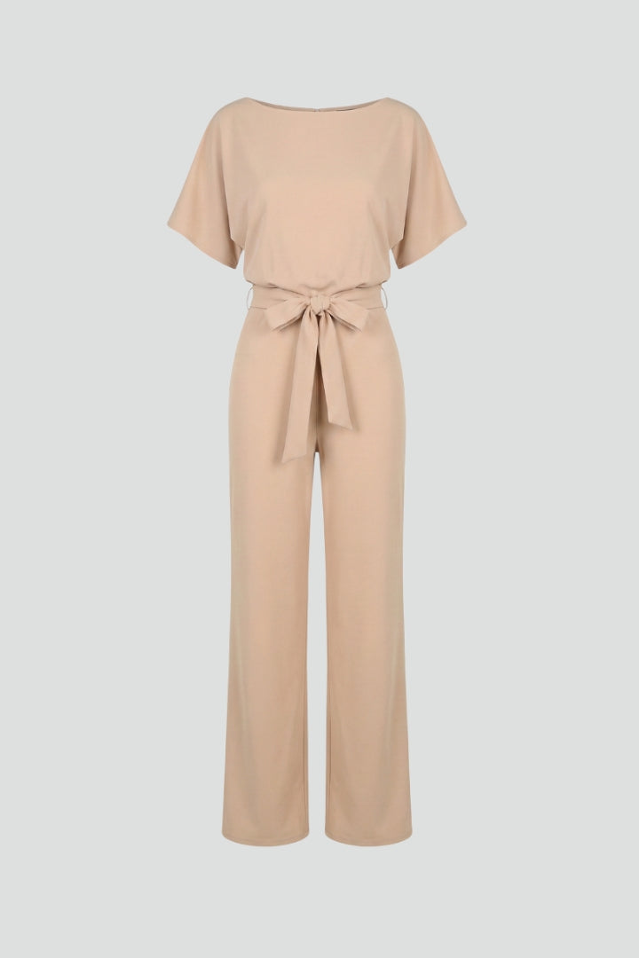 Women's wide-leg jumpsuit with short sleeves and a stylish self-tie belt. Perfect for casual or elegant looks.
