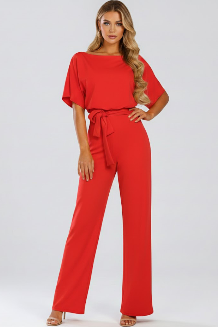 Fashionable women's wide-leg jumpsuit with short sleeves and a distinct belted waist detail, comfortable and chic.