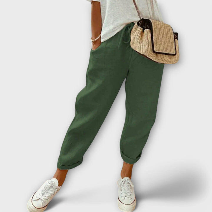 Breathable wide-leg women's linen pants, offering comfort and versatile style for summer fashion.