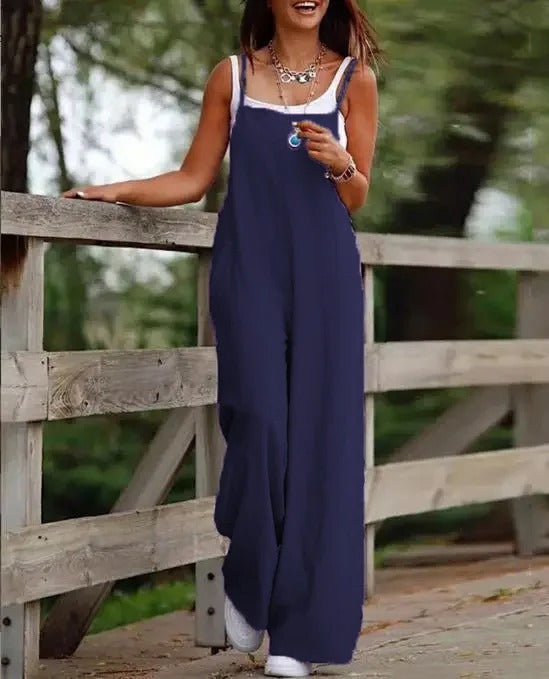 Stylish women's wide leg sleeveless dungaree jumpsuit. Relaxed fit design, ideal for summer casual outfits.