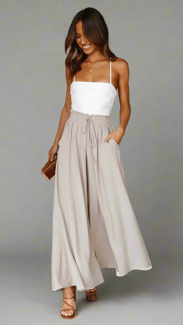 Versatile wide-leg pants for women, elastic waist, perfect for work or leisure.