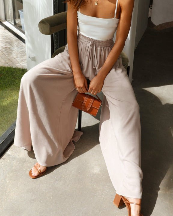Chic women's wide-leg pants, elasticated waist for a comfortable, flattering fit.