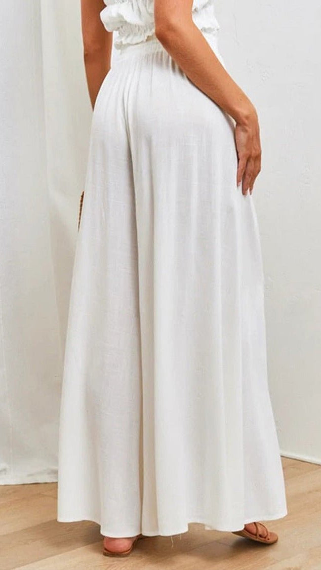 Chic wide-leg trousers, elastic waist, ideal for spring, summer, or autumn wear.
