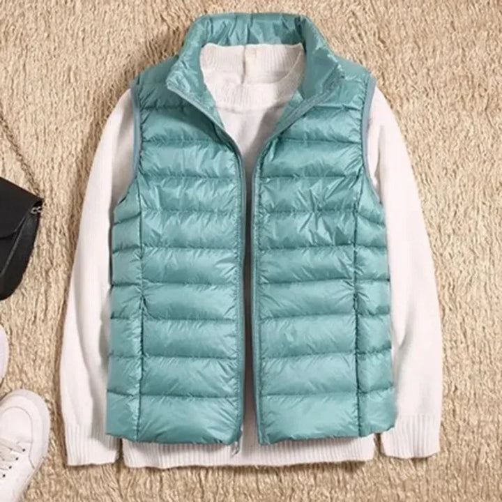 Casual women's wind-resistant vest, ideal for fall & spring fashion layering.