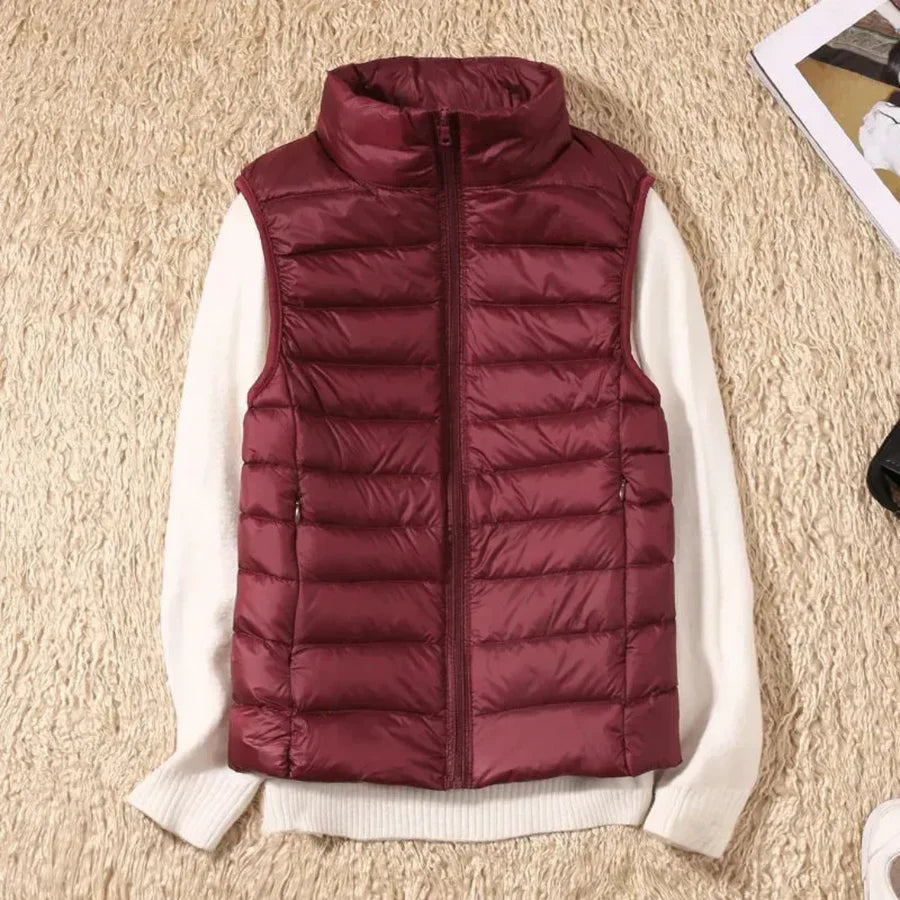 Stylish women's wind-resistant sleeveless jacket, great for casual fall and spring layering.