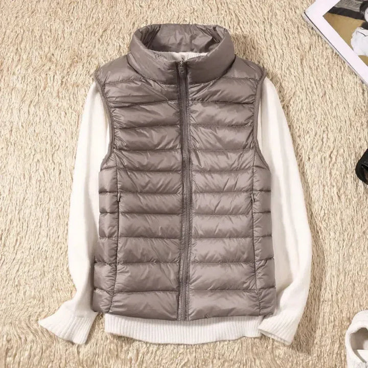 Women's new zippered wind-resistant bodywarmer. Excellent for spring & fall layering.