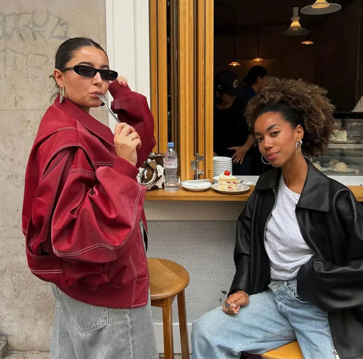 Women's wine red oversized quilted outerwear jacket, designed with eye-catching contrast stitching for fall.