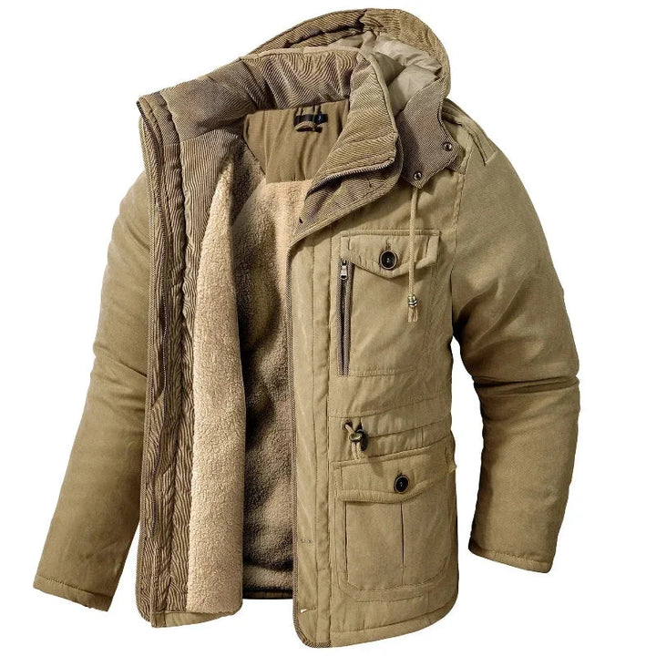 Women's Winter Utility Field Jacket with detachable hood, warm lining, and multiple pockets for outdoor adventures.