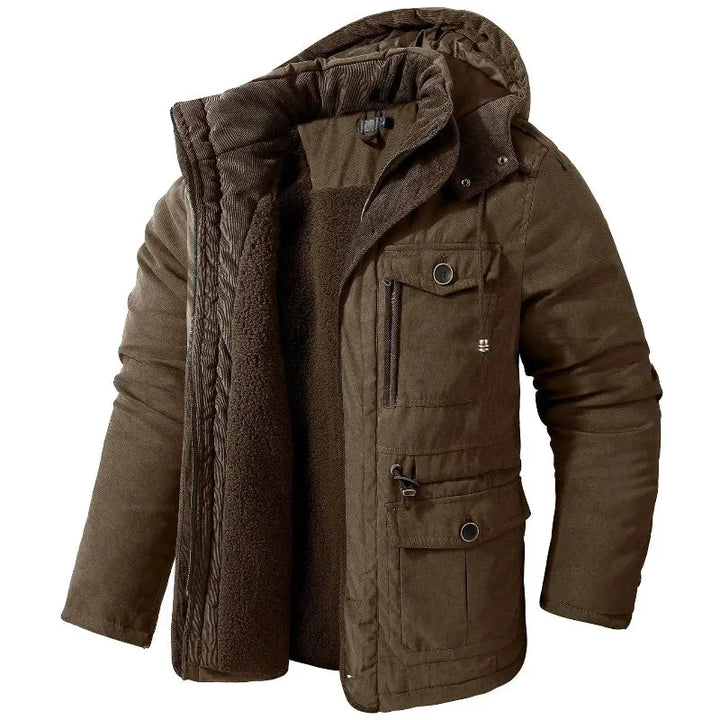 Durable women's winter field jacket featuring a warm, insulated lining and practical multi-pockets. Ideal for cold weather.