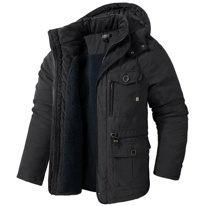 Cozy women's winter utility jacket, designed for adventure. Features a warm lining, detachable hood, and weatherproof finish.