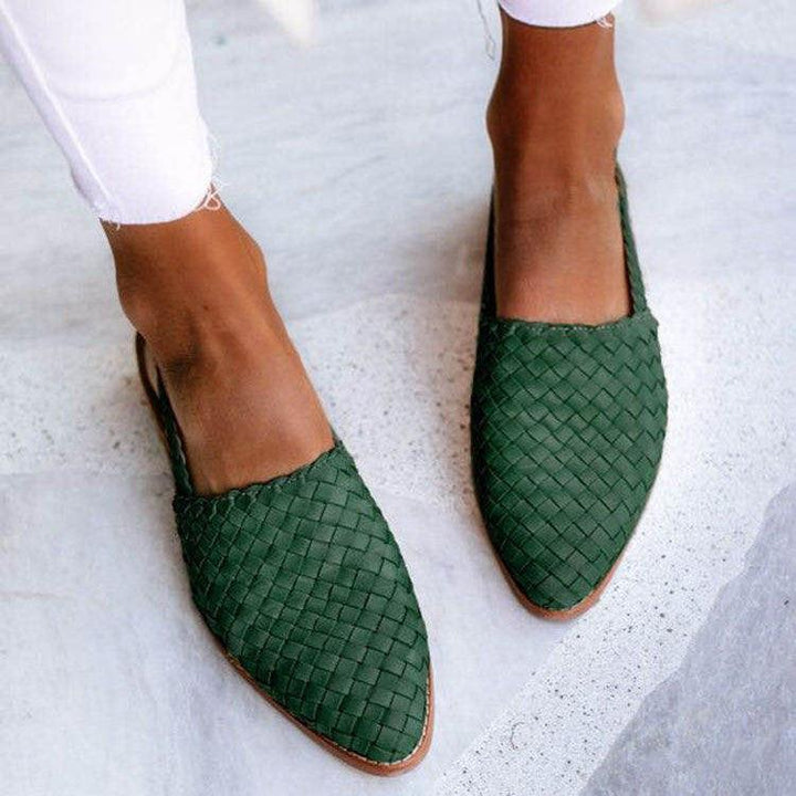 Close-up of women's closed-toe woven slingback flats, showcasing the breathable texture and chic design.