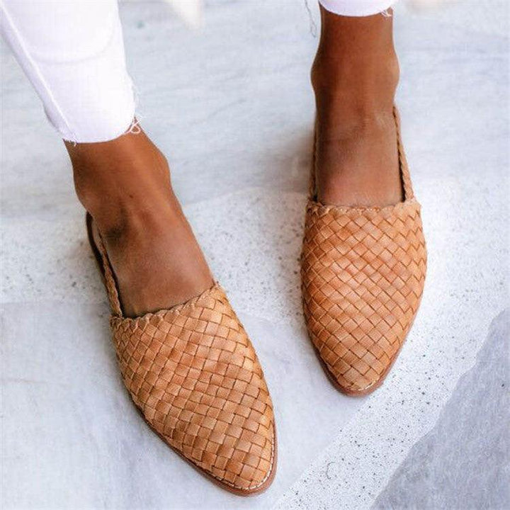 Women's comfortable slingback flats with an intricate woven design and closed toe, ideal for all-day wear.