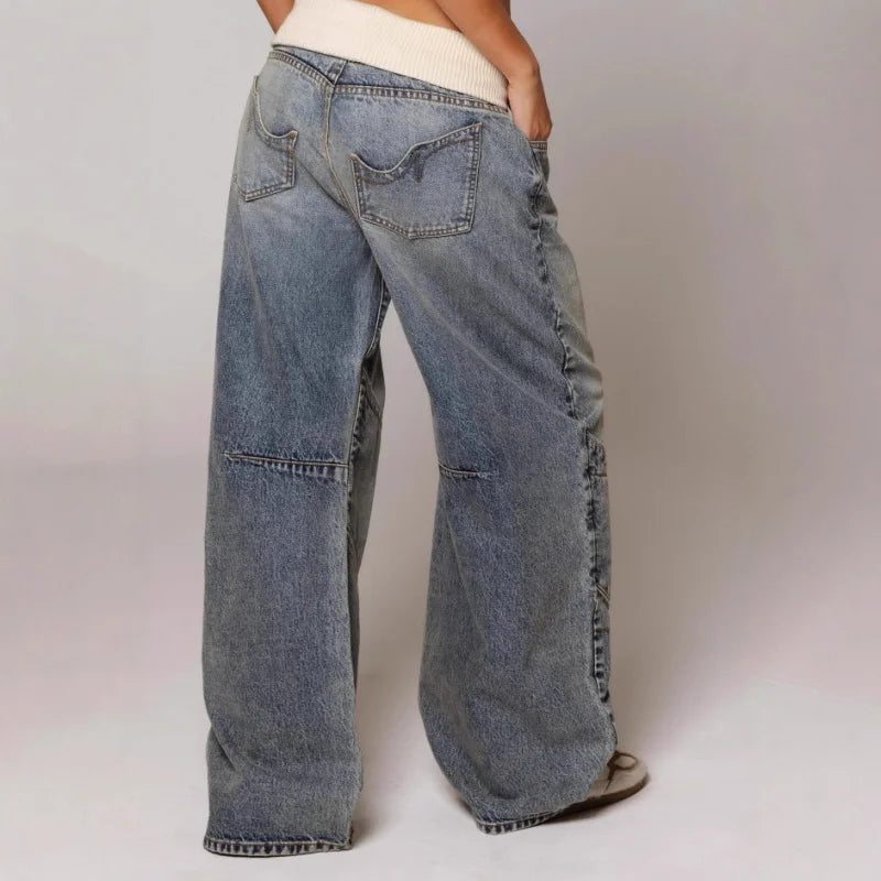 Retro Y2K women's baggy wide leg jeans, showcasing a comfortable ribbed waist and curved seam detail.