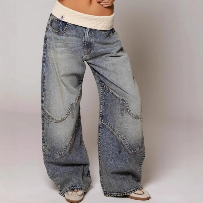 Streetwear Y2K women's baggy jeans, designed with a trendy wide leg and snug ribbed waistband.
