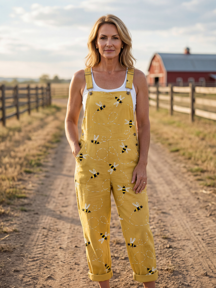 Women's yellow honeybee print jumpsuit. Relaxed fit, wide straps & straight leg for comfortable summer casual wear.