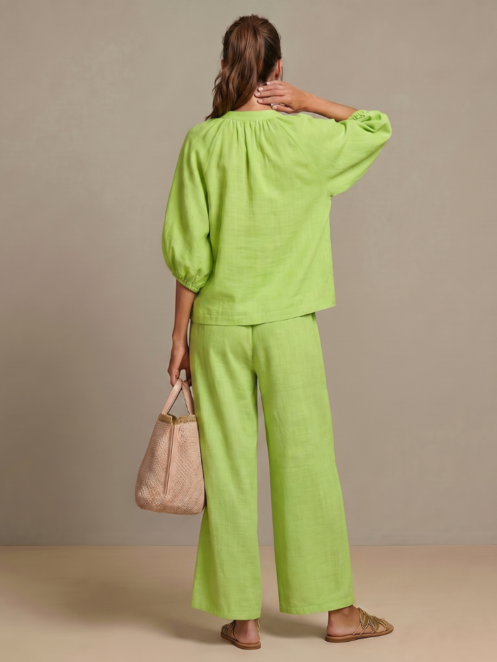 Women's comfortable set: Zip front blouson top & wide leg pants. Ideal for lounge or casual.