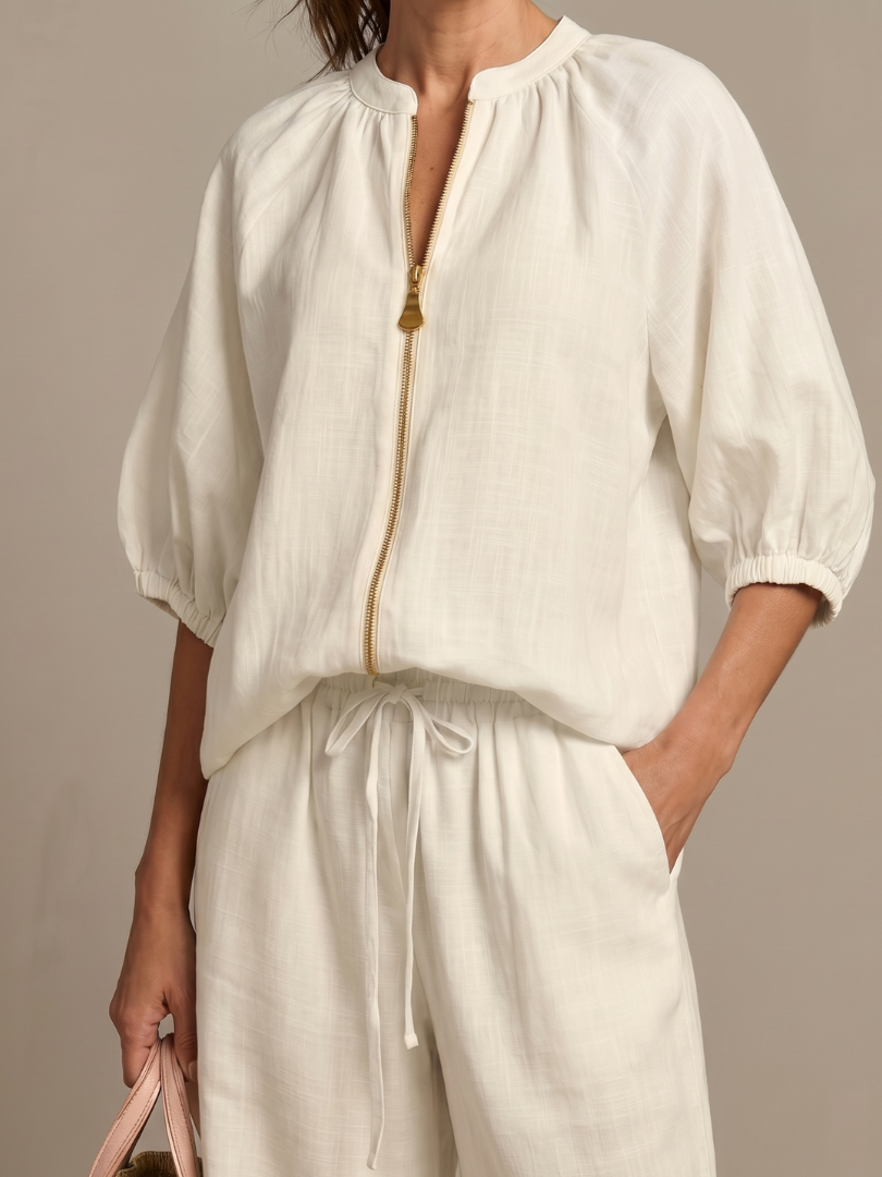 Summer ready women's set: Zip front blouson top and flowy wide leg pants. Comfortable fit.