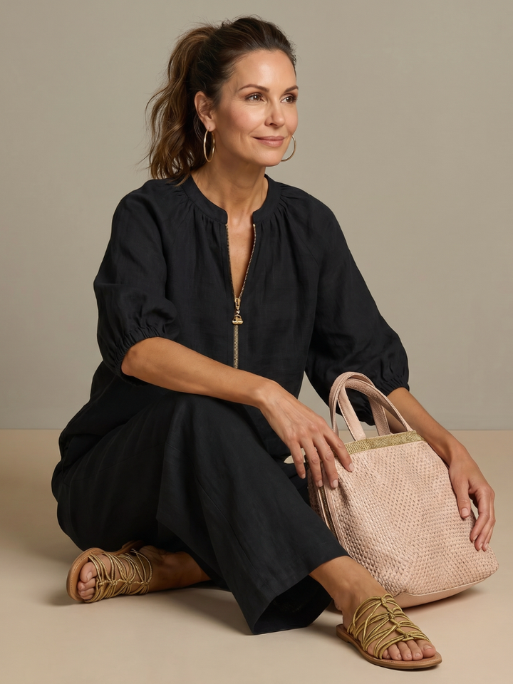 Women's everyday wear: Zip front blouson top & wide leg pants, a versatile two-piece set.