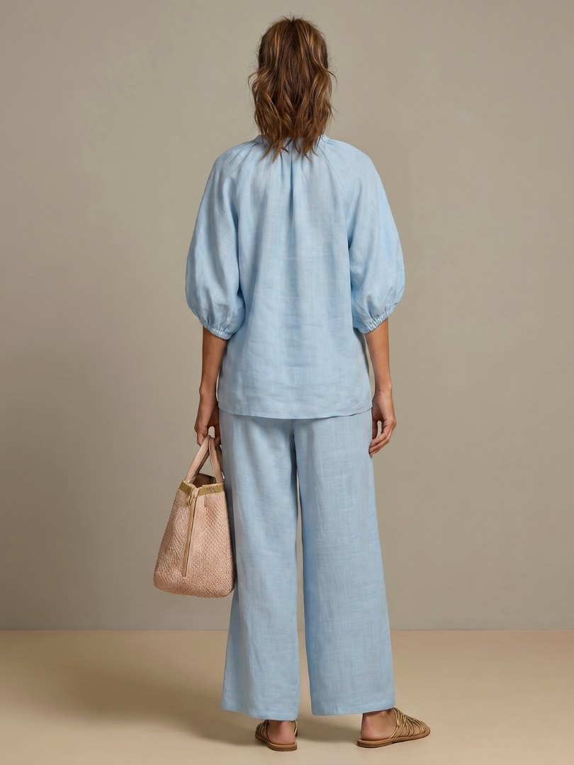 Comfortable lounge wear: Women's blouson top and wide leg pant matching set. Everyday style.
