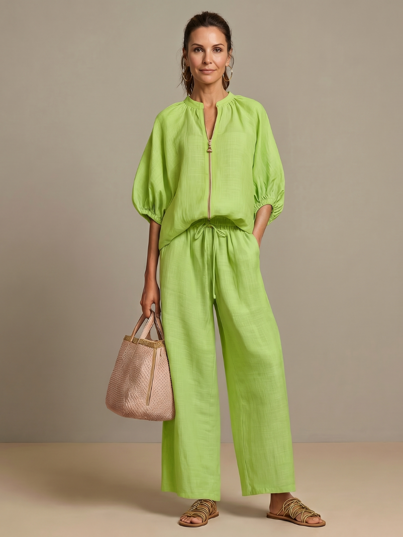 Everyday elegant women's matching set: zip blouson top & wide leg pants. Relaxed silhouette.