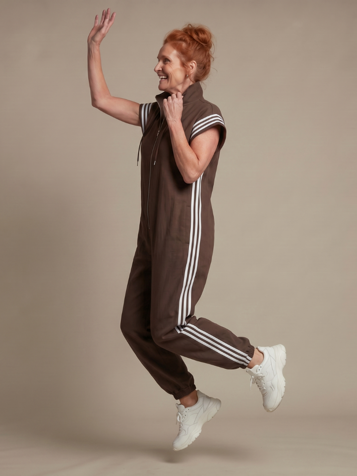 Versatile full-length women's stripe jumpsuit, designed with a front zip for easy wear & style.