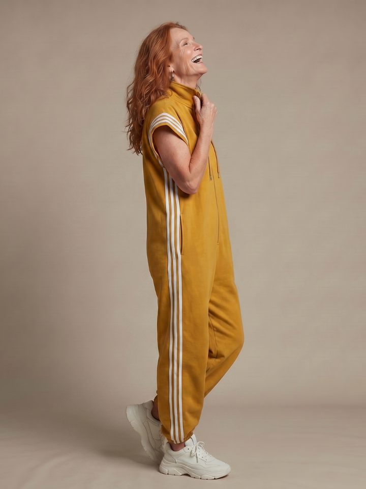 Comfortable women's stripe panel jumpsuit, full length, with a functional zip front & wide sleeves.