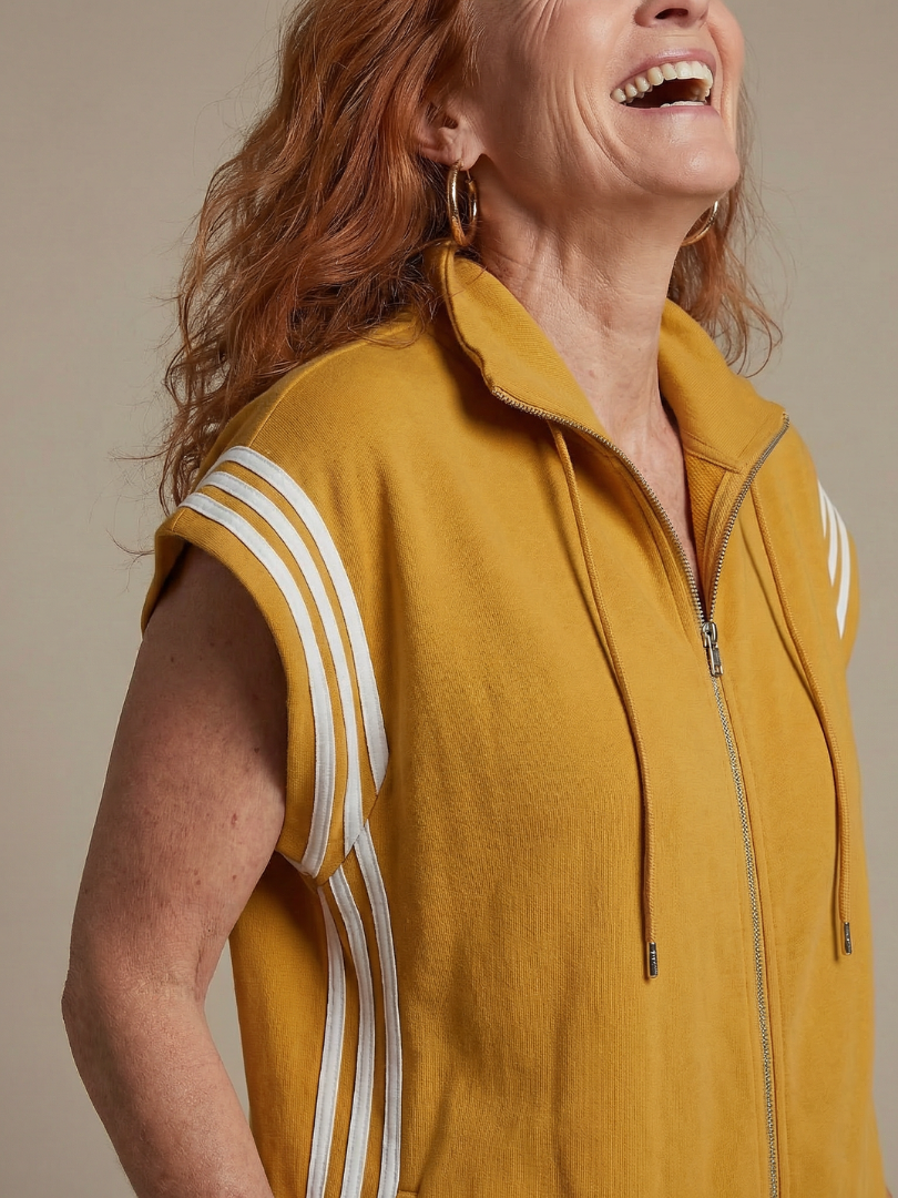 Women's zip front jumpsuit showcasing a contemporary stripe pattern & relaxed, wide sleeves.