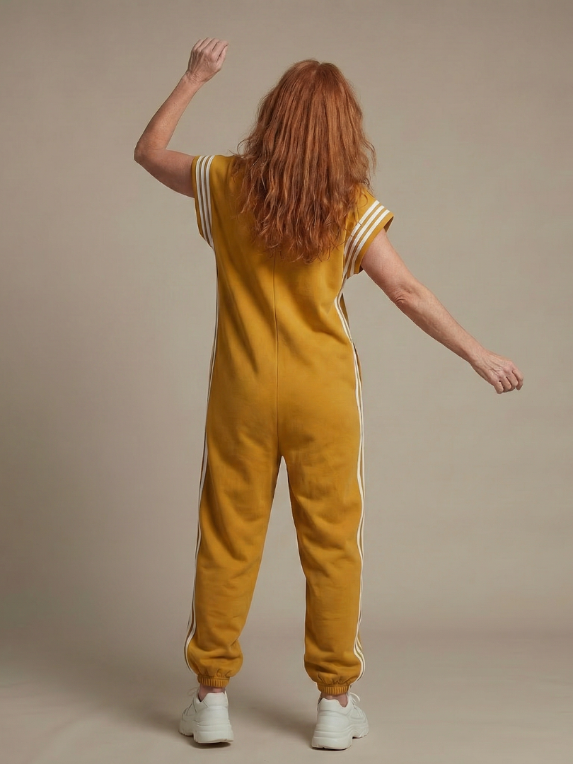 Fashionable women's one-piece with a front zip, striking stripe panels & a comfortable relaxed fit.