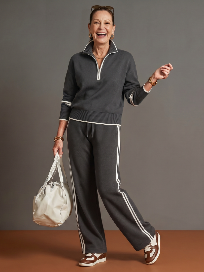 Women's casual co-ord set: long sleeve zip neck top and wide leg pants for ultimate comfort.