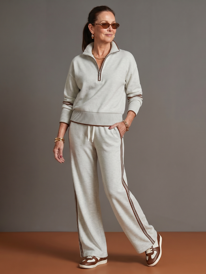 Versatile women's loungewear set: zip neck top, long sleeves, and wide leg pants.