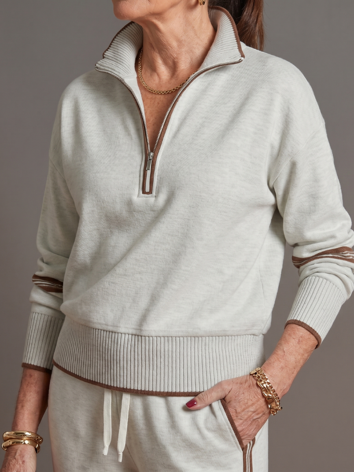 Women's matching set: zip neck long sleeve top and wide leg pants. Perfect for a relaxed vibe.