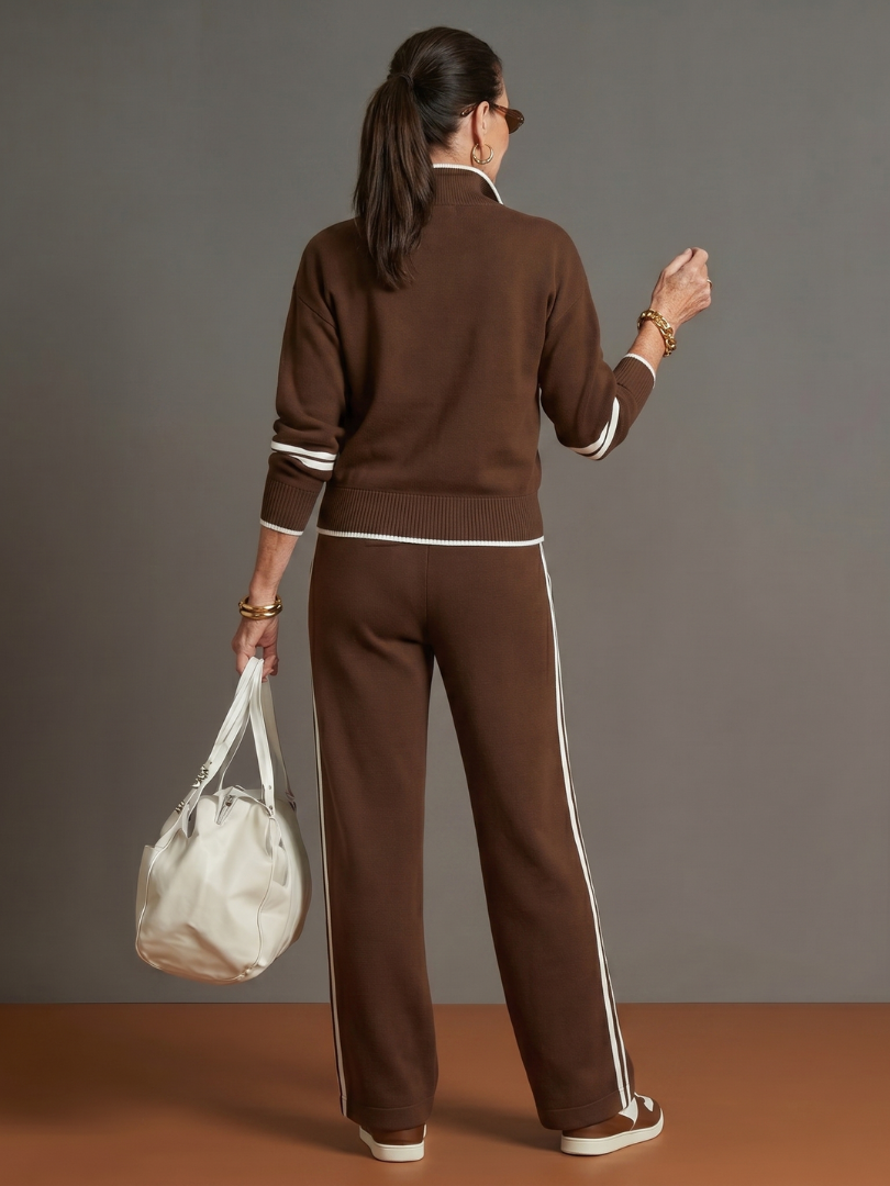 Comfortable women's loungewear set featuring a zip neck long sleeve top and wide leg pants.