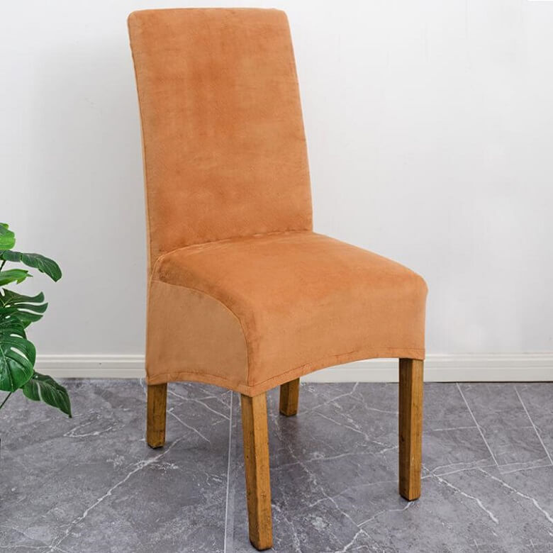 Sophisticated XL stretch velvet chair cover for elegant dining rooms.