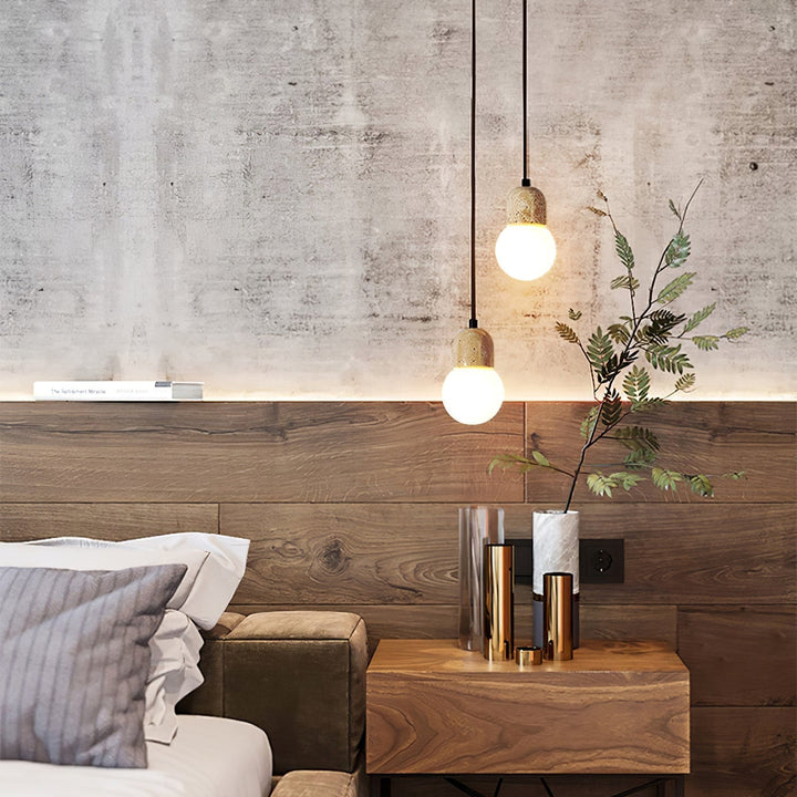 Ambient lighting with a yellow travertine & walnut pendant lamp, adding warmth to any room.