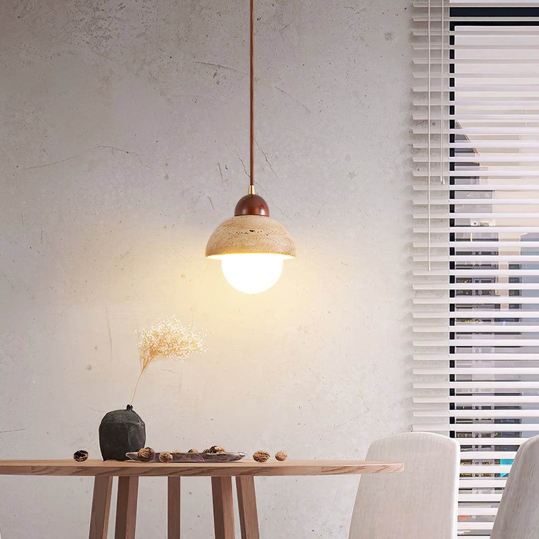 Elegant yellow travertine pendant light with rich walnut wood accents, ideal for ambient lighting.